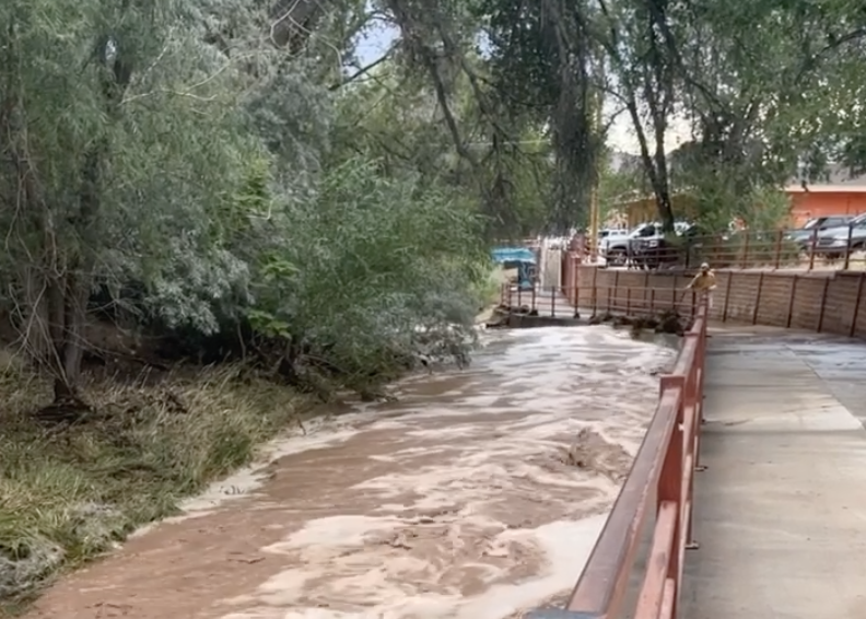 Flood waters reached the bike path behind Woody's Tavern.