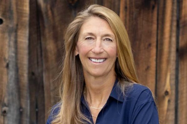 a woman smiling at the camera