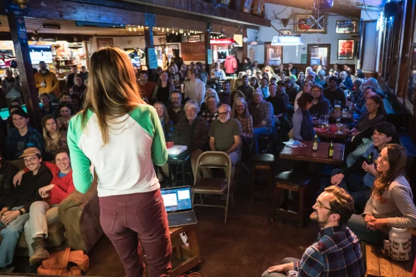 Audience engaged in a Science on tap presentation.