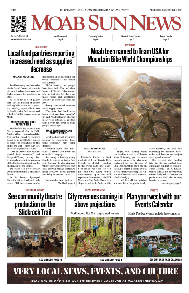 The cover of the Moab Sun News with a cyclist biking in scenic Moab desert at sunrise, showcasing local outdoor activities from Moab Sun News site.