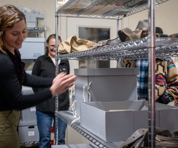 Museum staff leads tour of collection storage facility