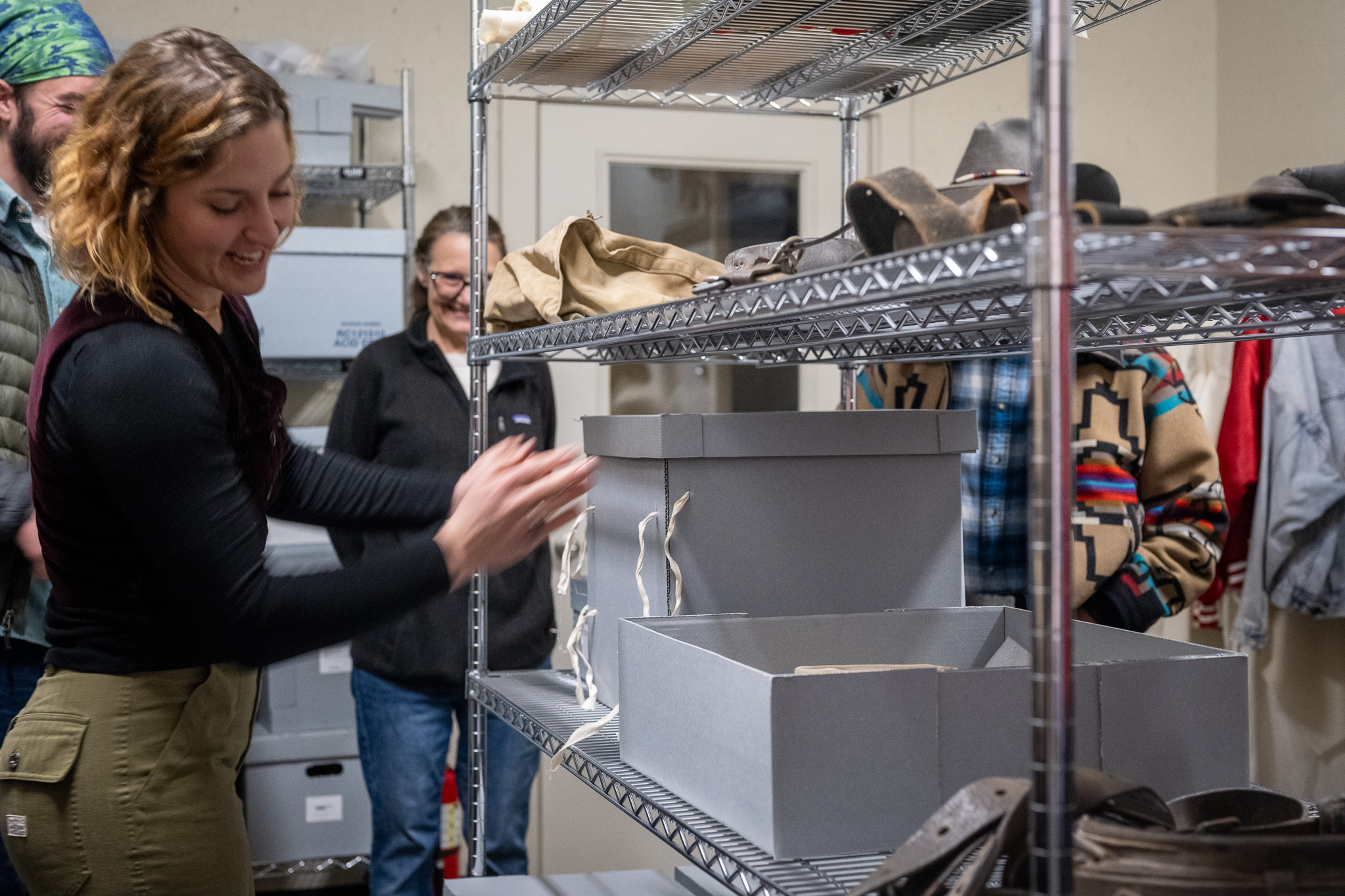 Museum staff leads tour of collection storage facility